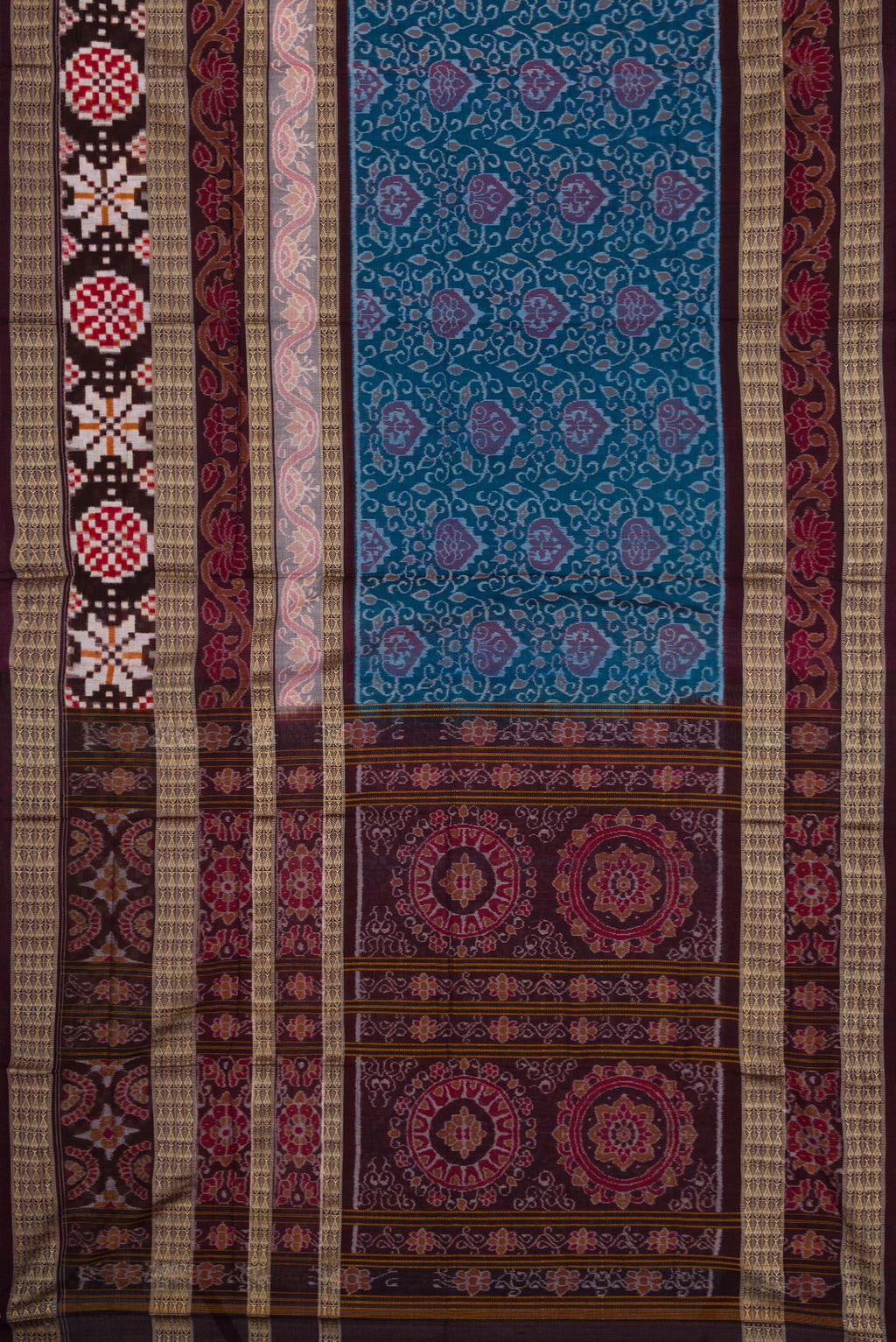 Flat view of Blue Dual Tone Double Ikat Saree with Ikat Print on the body and Thread Border. 