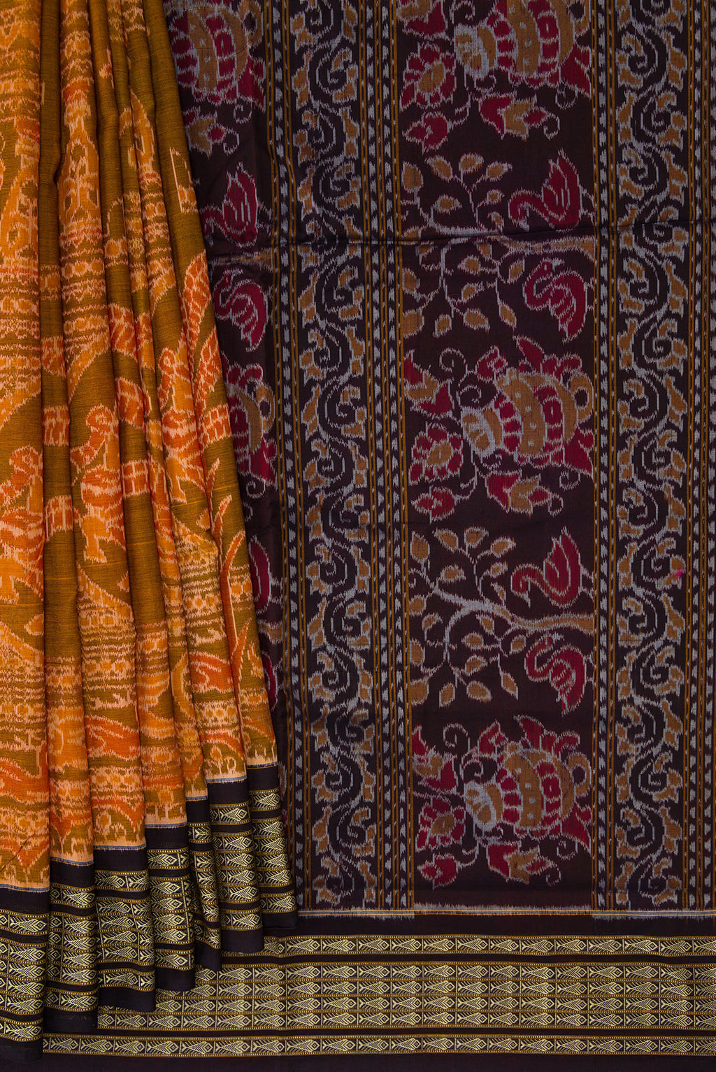 Pleats and pallu of Mustard Dual Tone Double Ikat Saree with Ikat Print on the body and Thread Border. 