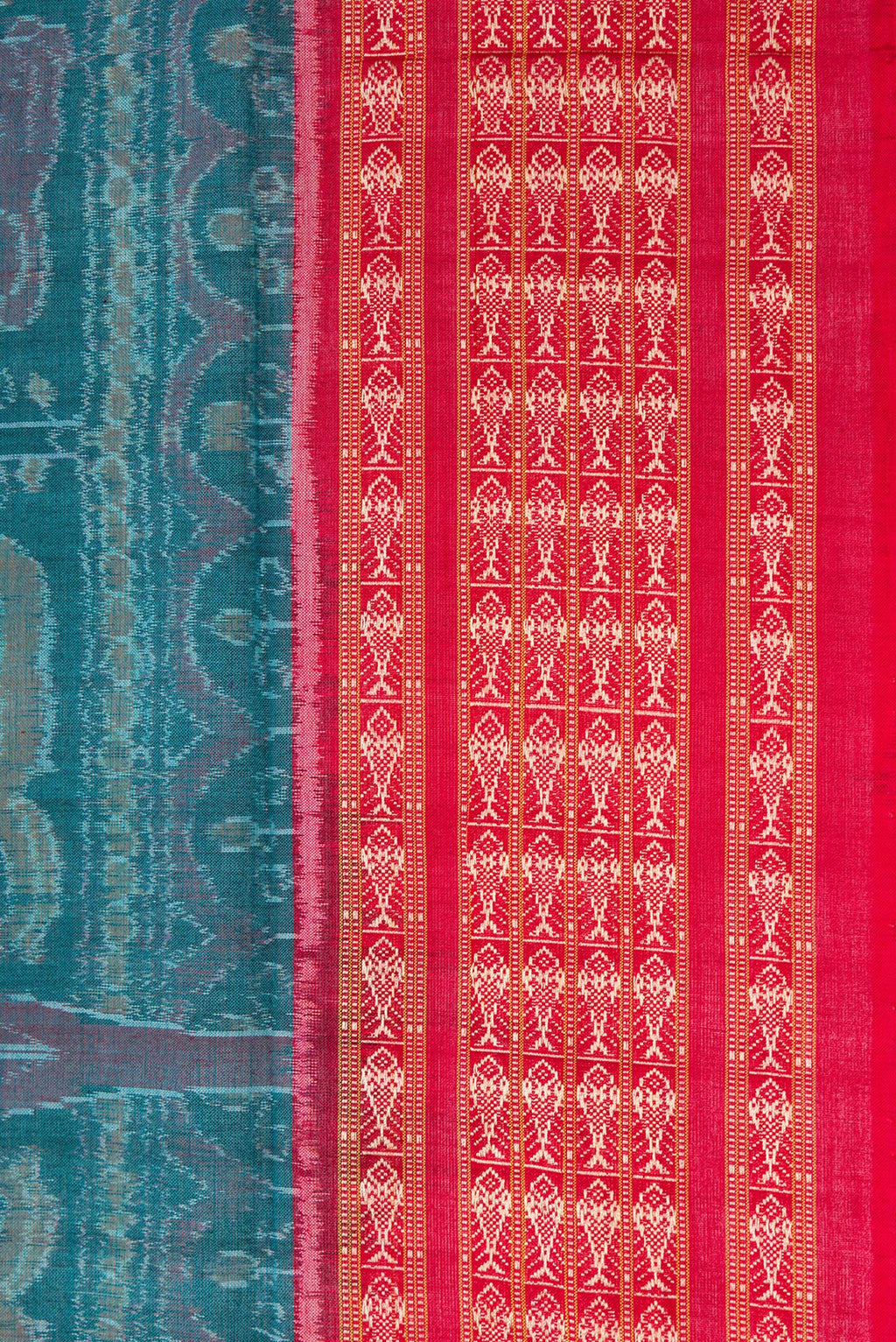Border image of Peacock Blue Dual Tone Double Ikat Saree with Ikat Print on the body and Thread Border. 