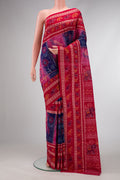 Royal Blue Dual Tone Double Ikat Saree with Ikat Print on the body and Thread Border.  displayed on a mannequin