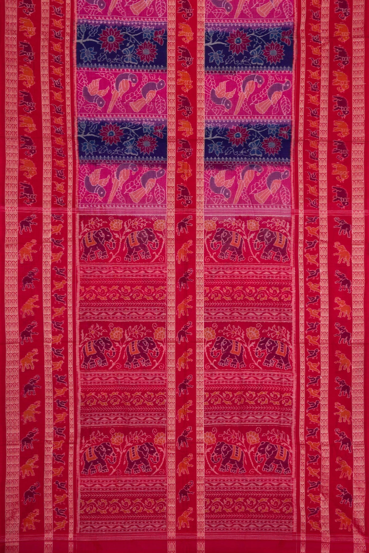 Flat view of Royal Blue Dual Tone Double Ikat Saree with Ikat Print on the body and Thread Border. 