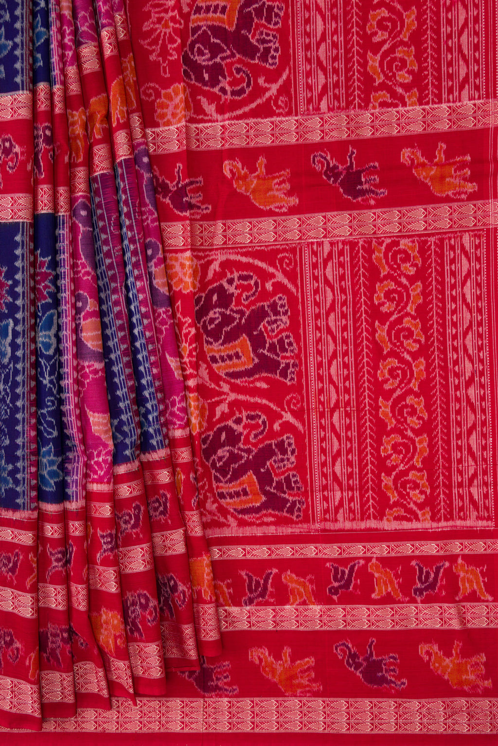 Pleats and pallu of Royal Blue Dual Tone Double Ikat Saree with Ikat Print on the body and Thread Border. 