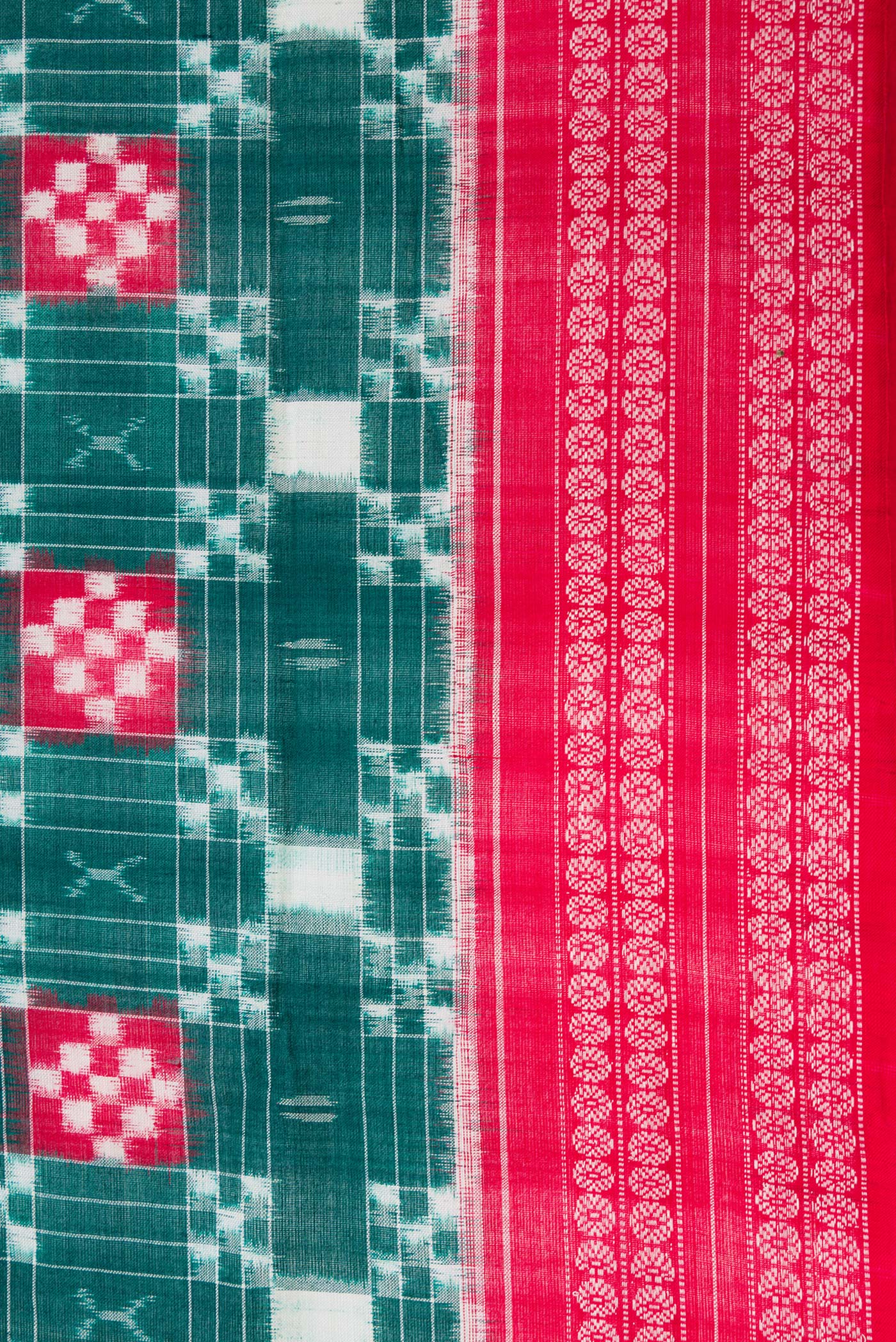 Border image of Bottle Green Dual Tone Double Ikat Saree with Ikat Print on the body and Thread Border. 