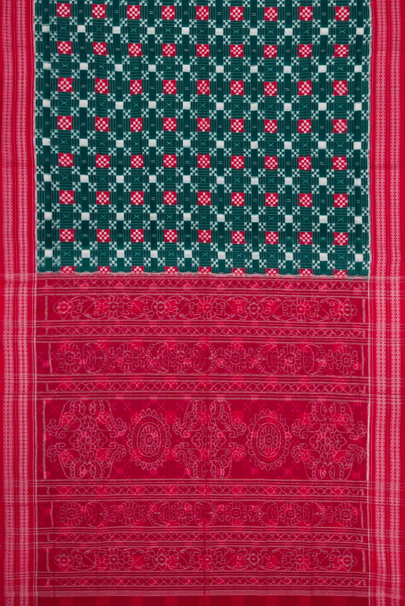 Flat view of Bottle Green Dual Tone Double Ikat Saree with Ikat Print on the body and Thread Border. 