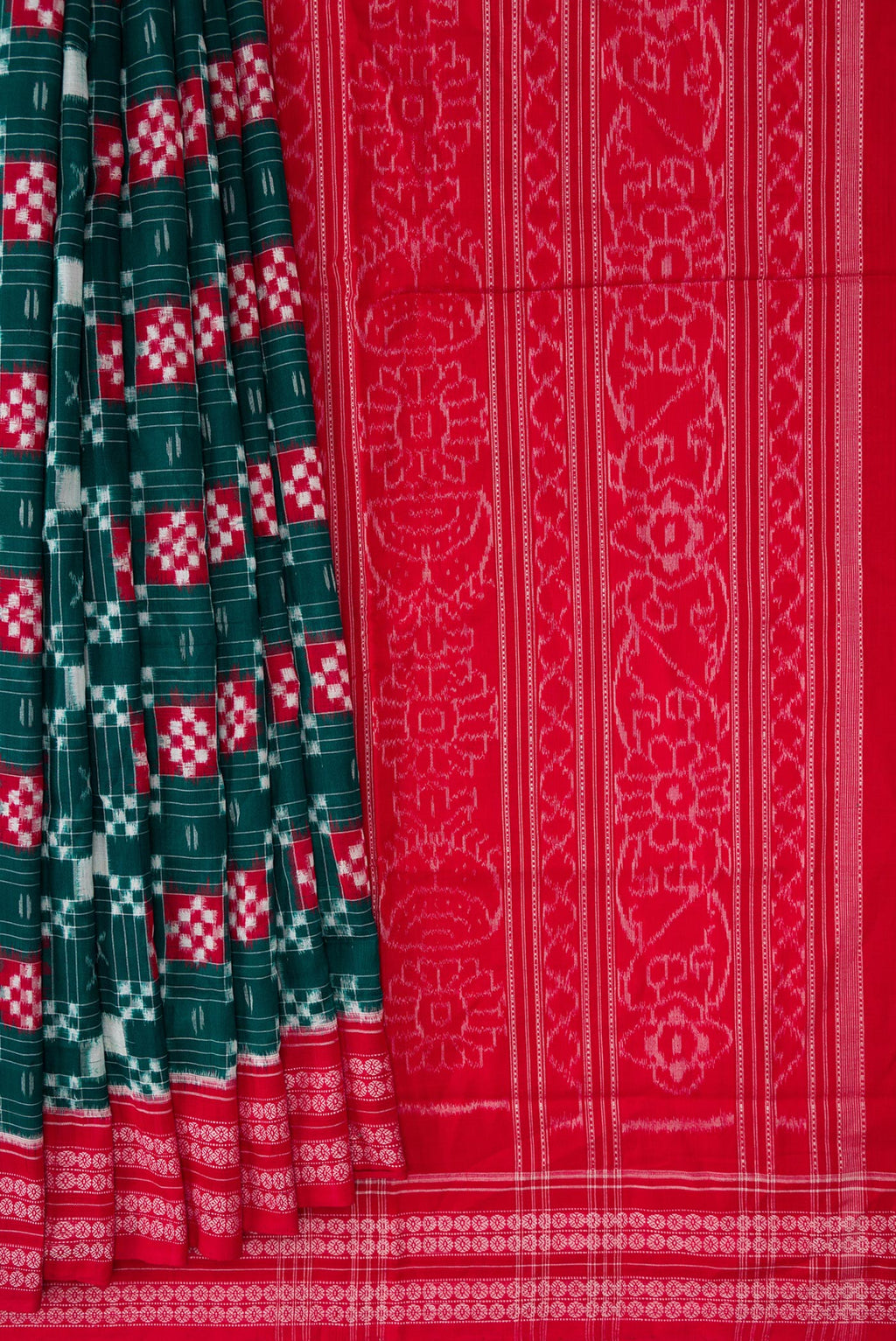 Pleats and pallu of Bottle Green Dual Tone Double Ikat Saree with Ikat Print on the body and Thread Border. 