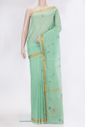 Sea Green Uppada Cotton Saree with Zari And Thread Butta on the body and Zari Border.  displayed on a mannequin