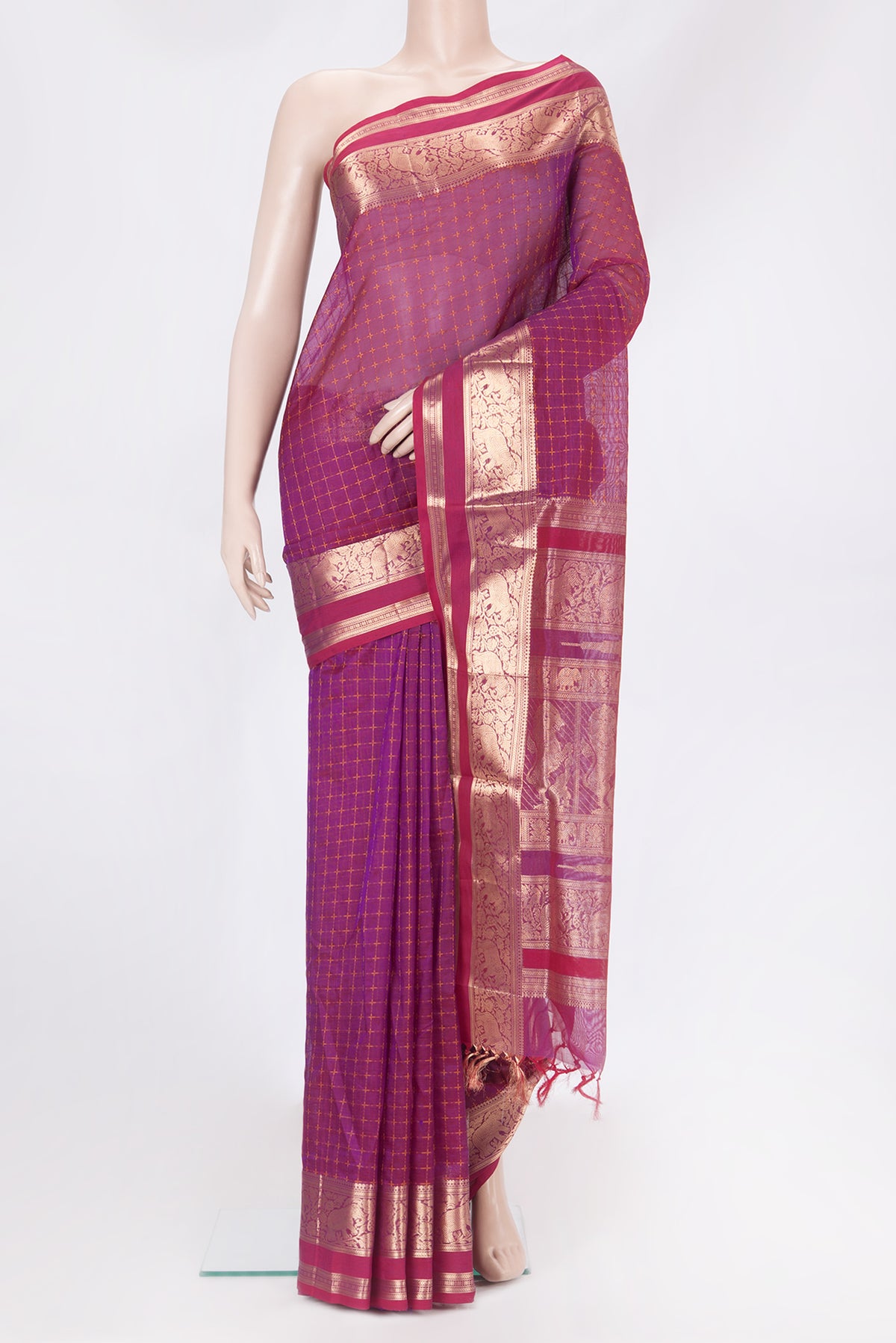 Purple Silk Cotton Saree with Checked design on the body and Zari Border.  displayed on a mannequin