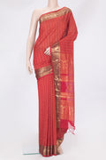 Red Silk Cotton Saree with Checked design on the body and Zari And Thread Border.  displayed on a mannequin