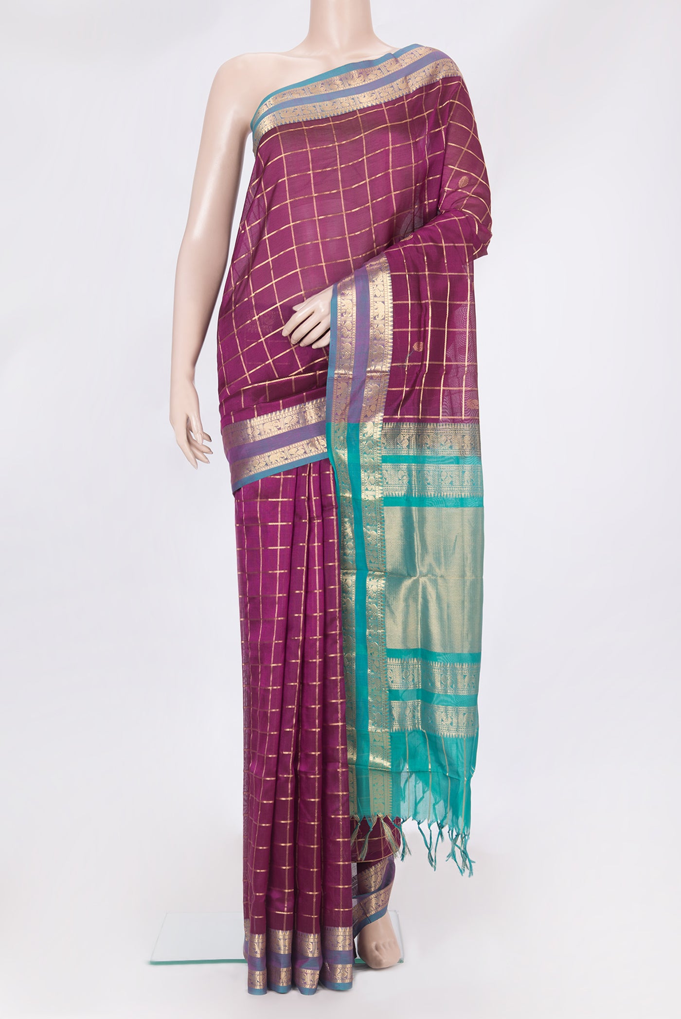 Magenta Silk Cotton Saree with Checked design on the body and Zari Border.  displayed on a mannequin