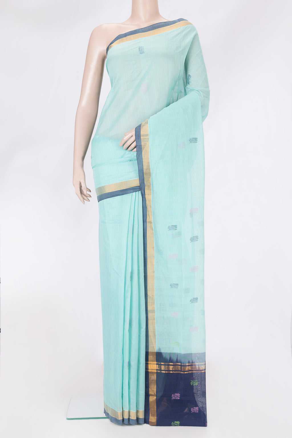 Sky Blue Uppada Cotton Saree with Thread Butta on the body and Zari Border.  displayed on a mannequin