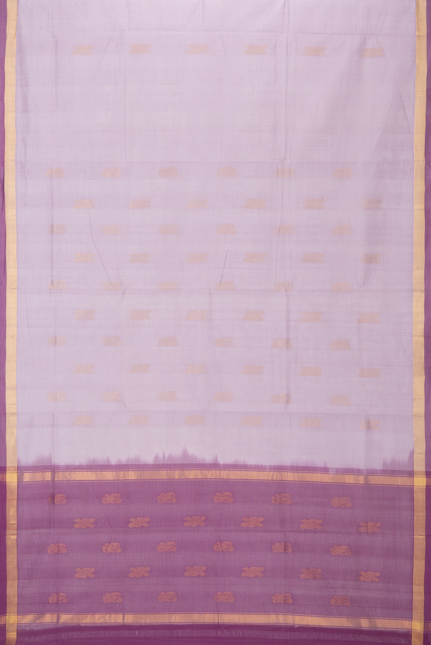 Flat view of Lavender Uppada Cotton Saree with Zari Butta on the body and Zari Border. 