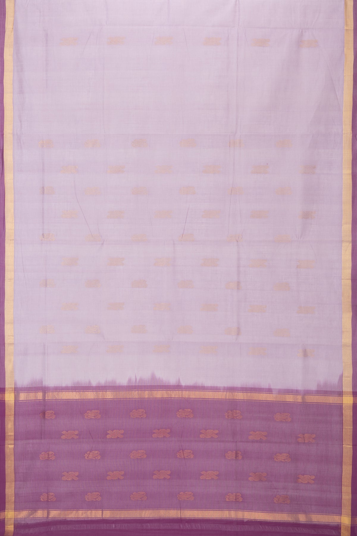 Flat view of Lavender Uppada Cotton Saree with Zari Butta on the body and Zari Border. 