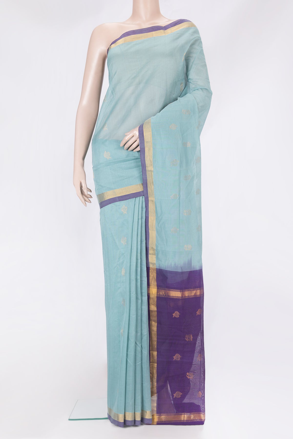 Light Blue Uppada Cotton Saree with Zari Butta on the body and Zari Border.  displayed on a mannequin