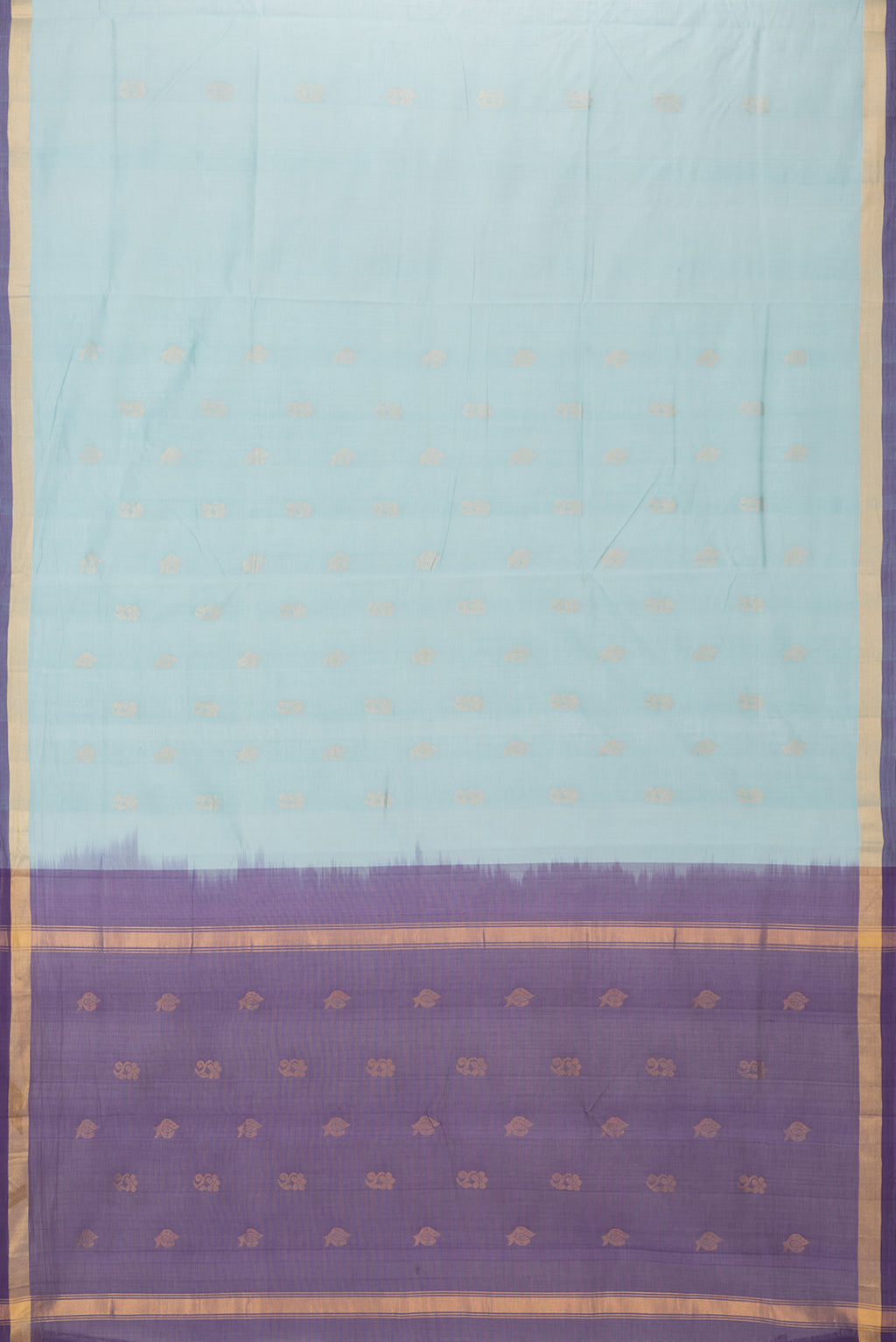 Flat view of Light Blue Uppada Cotton Saree with Zari Butta on the body and Zari Border. 