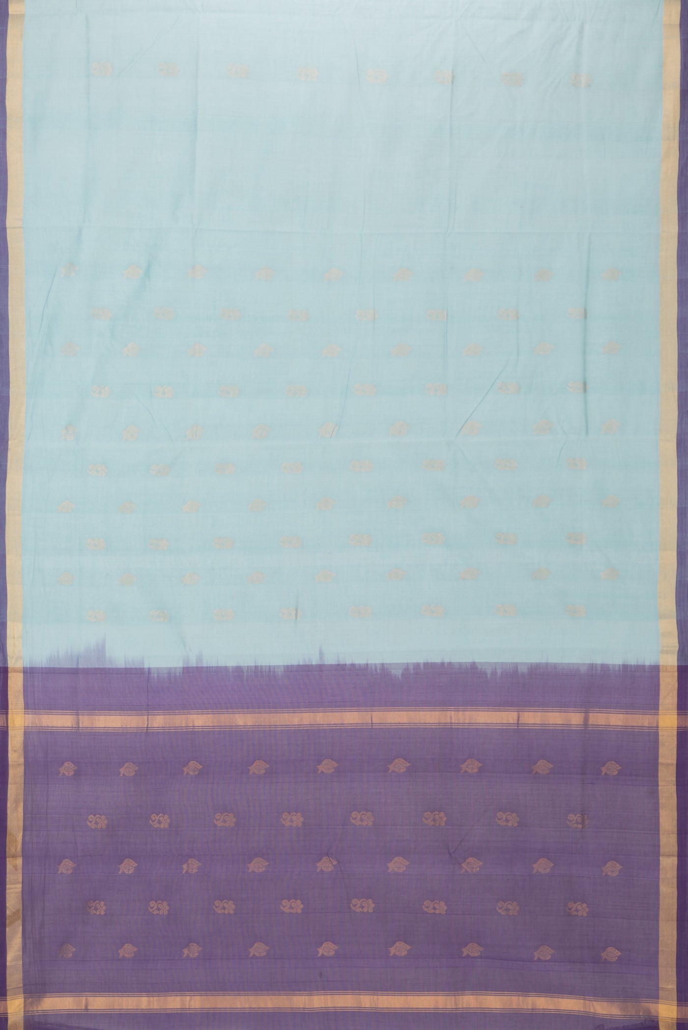Flat view of Light Blue Uppada Cotton Saree with Zari Butta on the body and Zari Border. 