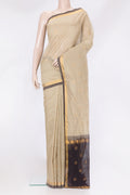 Beige Uppada Cotton Saree with Zari Butta on the body and Zari Border.  displayed on a mannequin