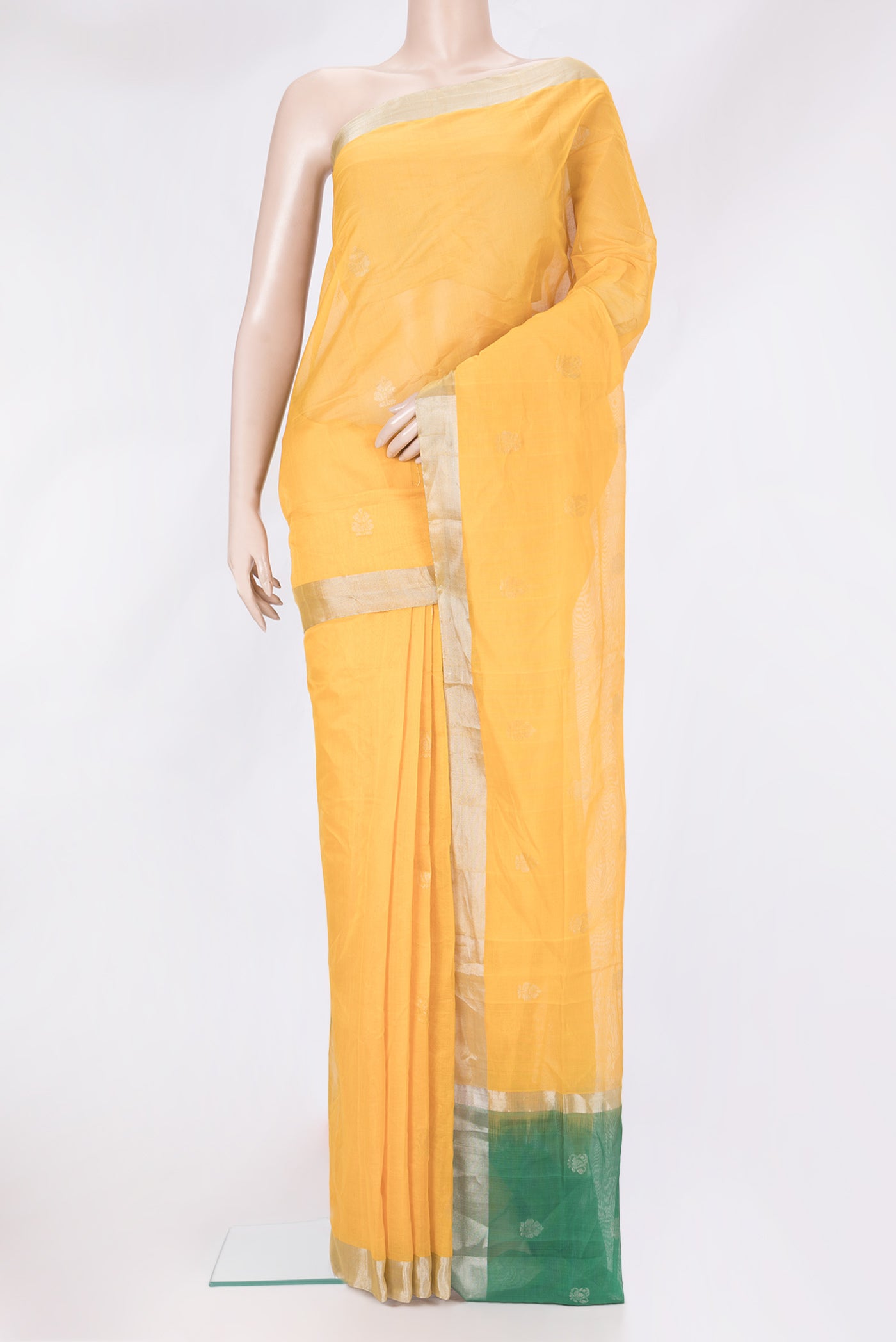 Yellow Uppada Cotton Saree with Zari Butta on the body and Zari Border.  displayed on a mannequin