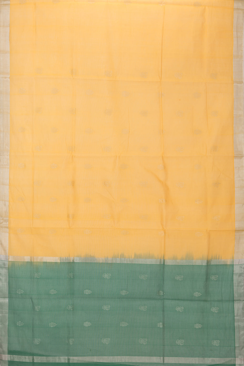 Flat view of Yellow Uppada Cotton Saree with Zari Butta on the body and Zari Border. 