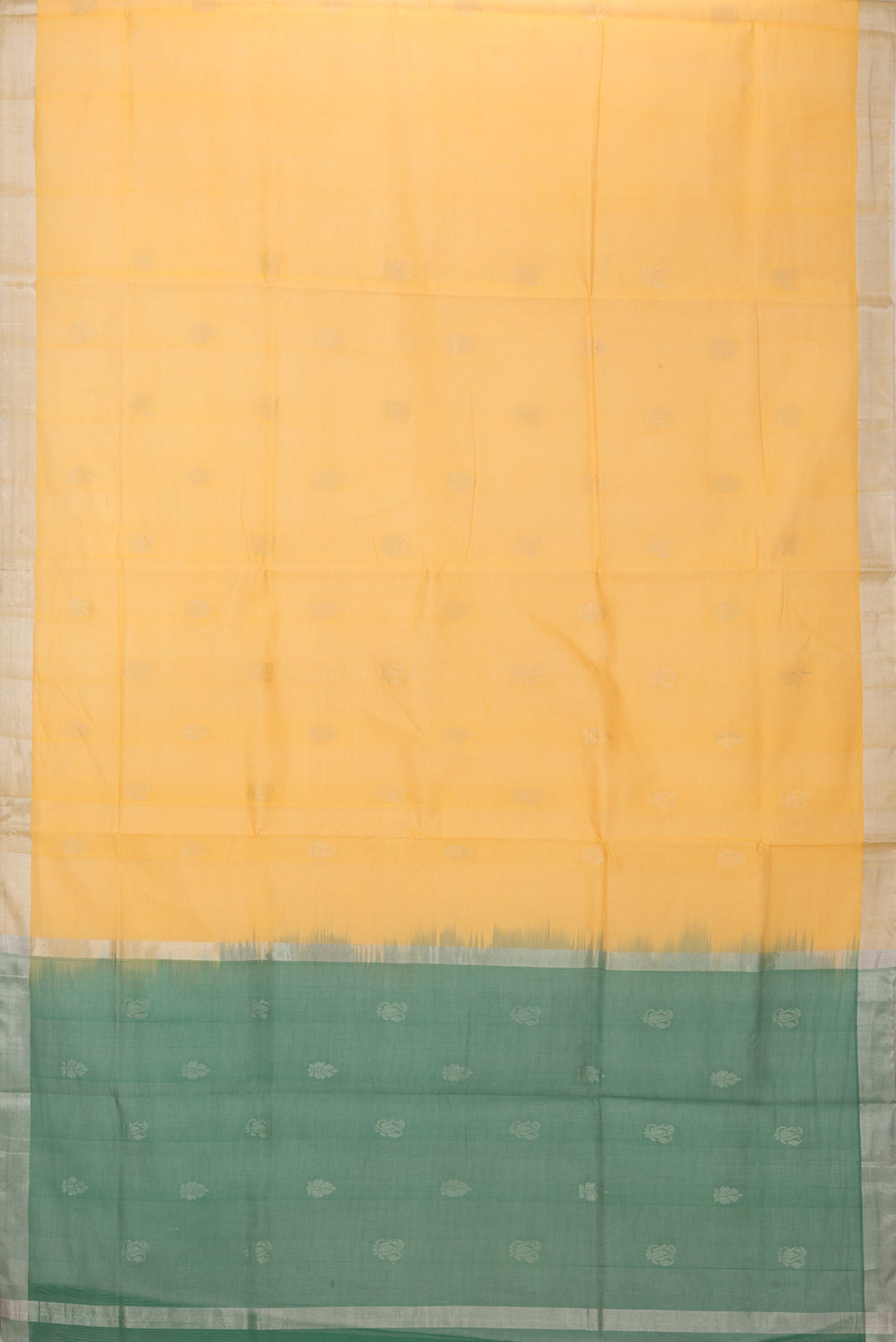 Flat view of Yellow Uppada Cotton Saree with Zari Butta on the body and Zari Border. 