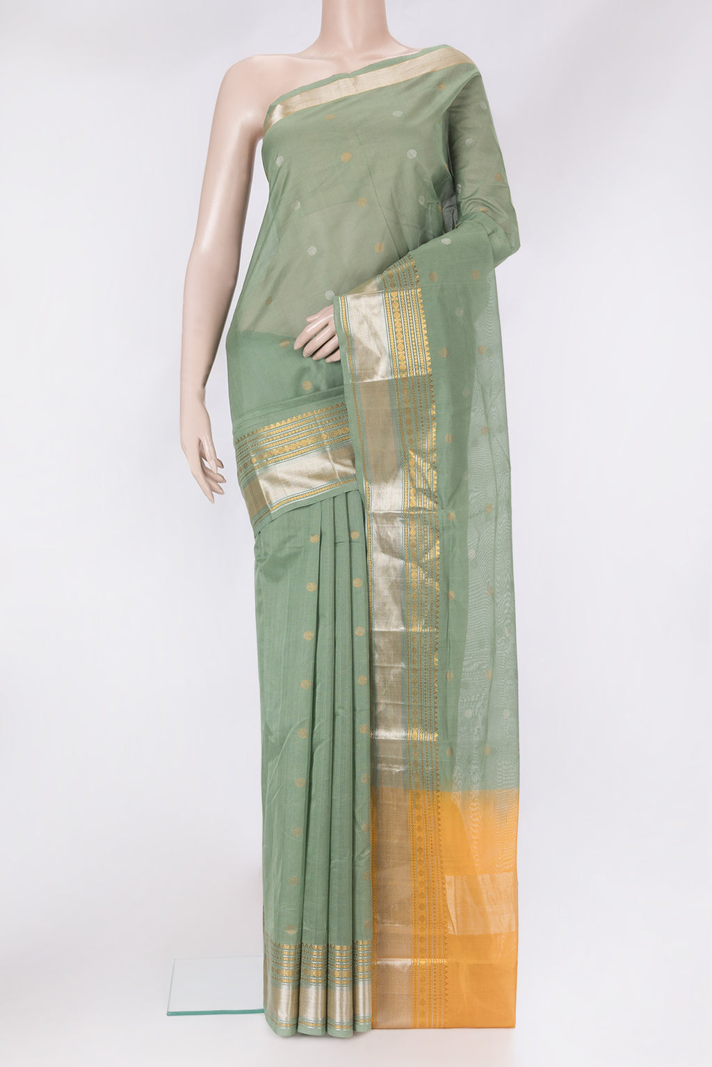 Pista Green Uppada Cotton Saree with Zari Butta on the body and Zari Border.  displayed on a mannequin