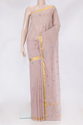 Rose Gold Uppada Cotton Saree with Zari And Thread Butta on the body and Zari Border.  displayed on a mannequin