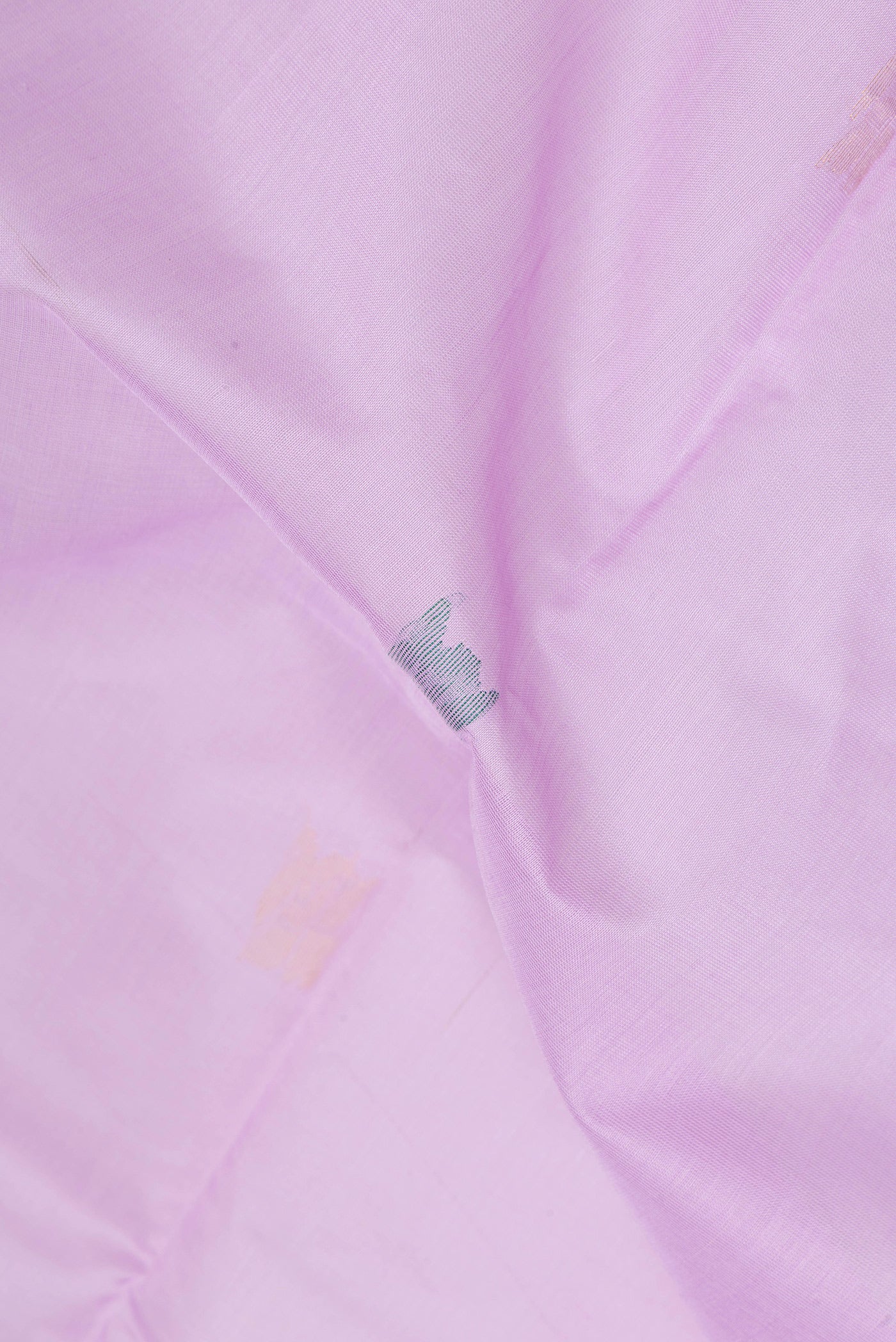 Close up of Lavender Uppada Cotton Saree with Zari And Thread Butta on the body and Zari Border.  displaying folds