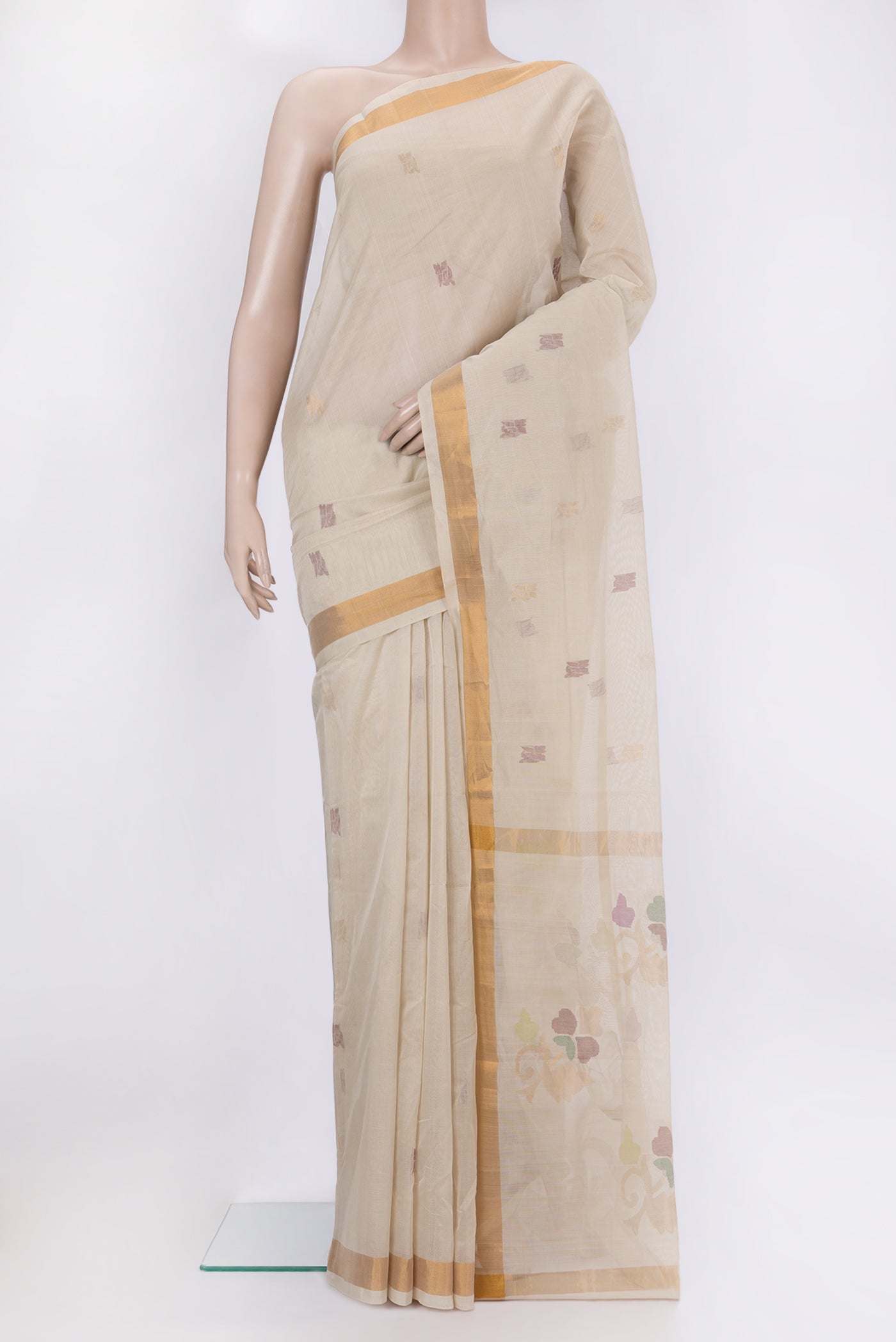 Beige Uppada Cotton Saree with Zari And Thread Butta on the body and Zari Border.  displayed on a mannequin