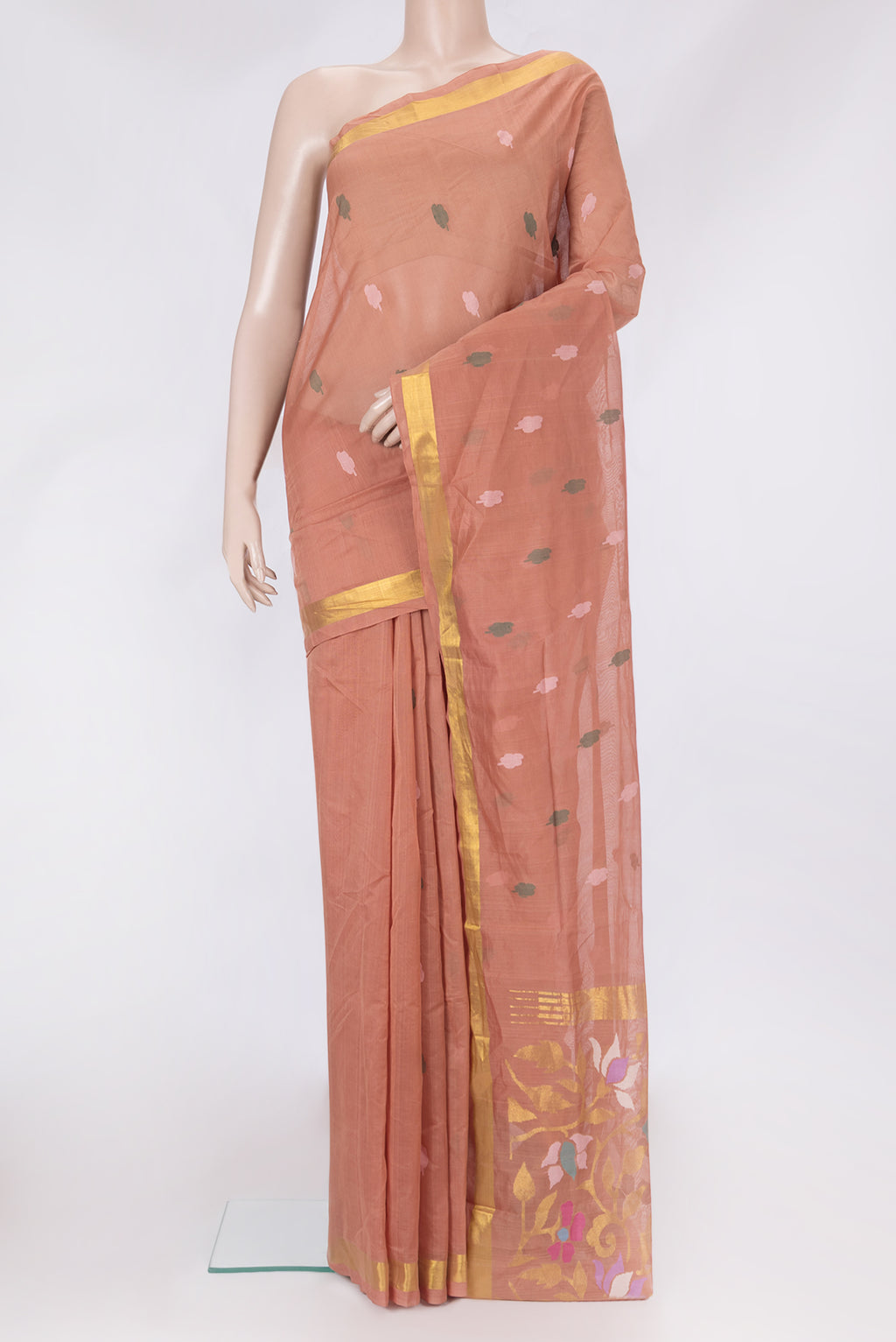 Rose Gold Uppada Cotton Saree with Thread Butta on the body and Zari Border.  displayed on a mannequin