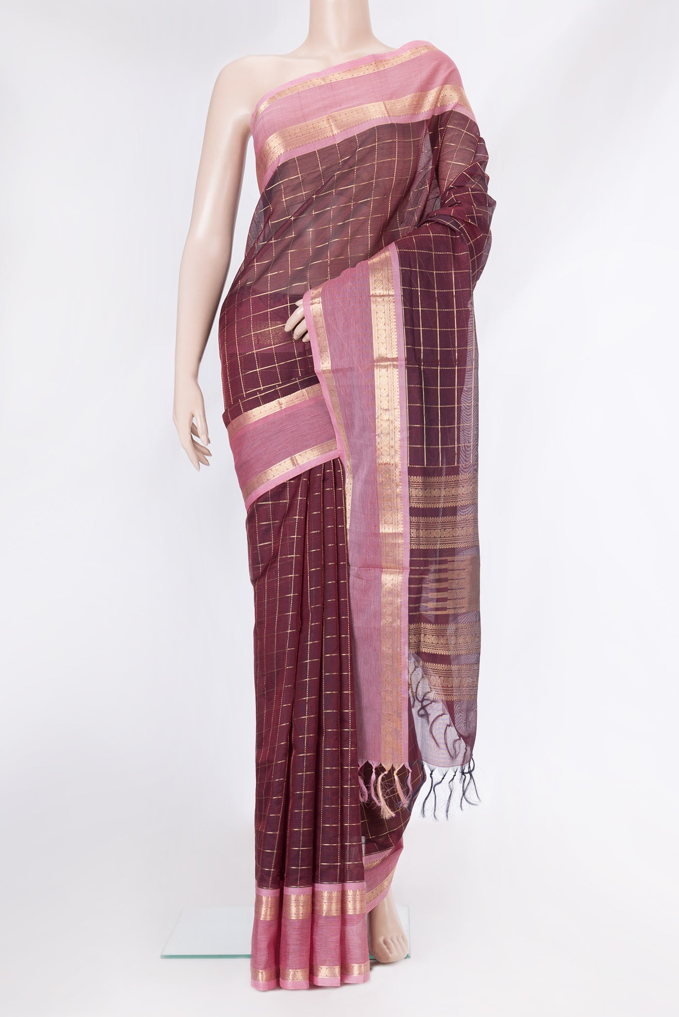 Maroon Dual Tone Silk Cotton Saree with Checked design on the body and Zari Border.  displayed on a mannequin