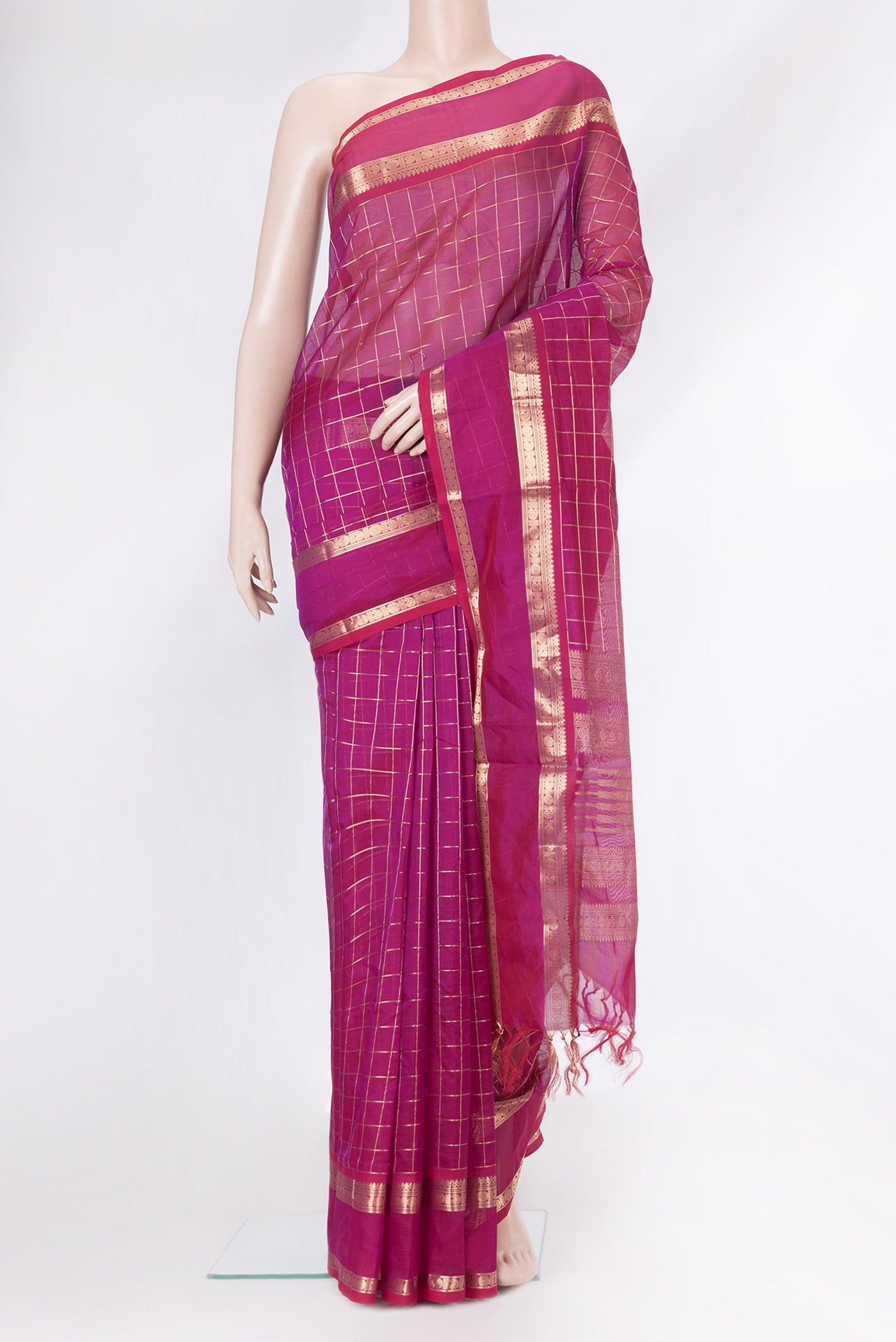 Magenta Dual Tone Silk Cotton Saree with Checked design on the body and Zari Border.  displayed on a mannequin