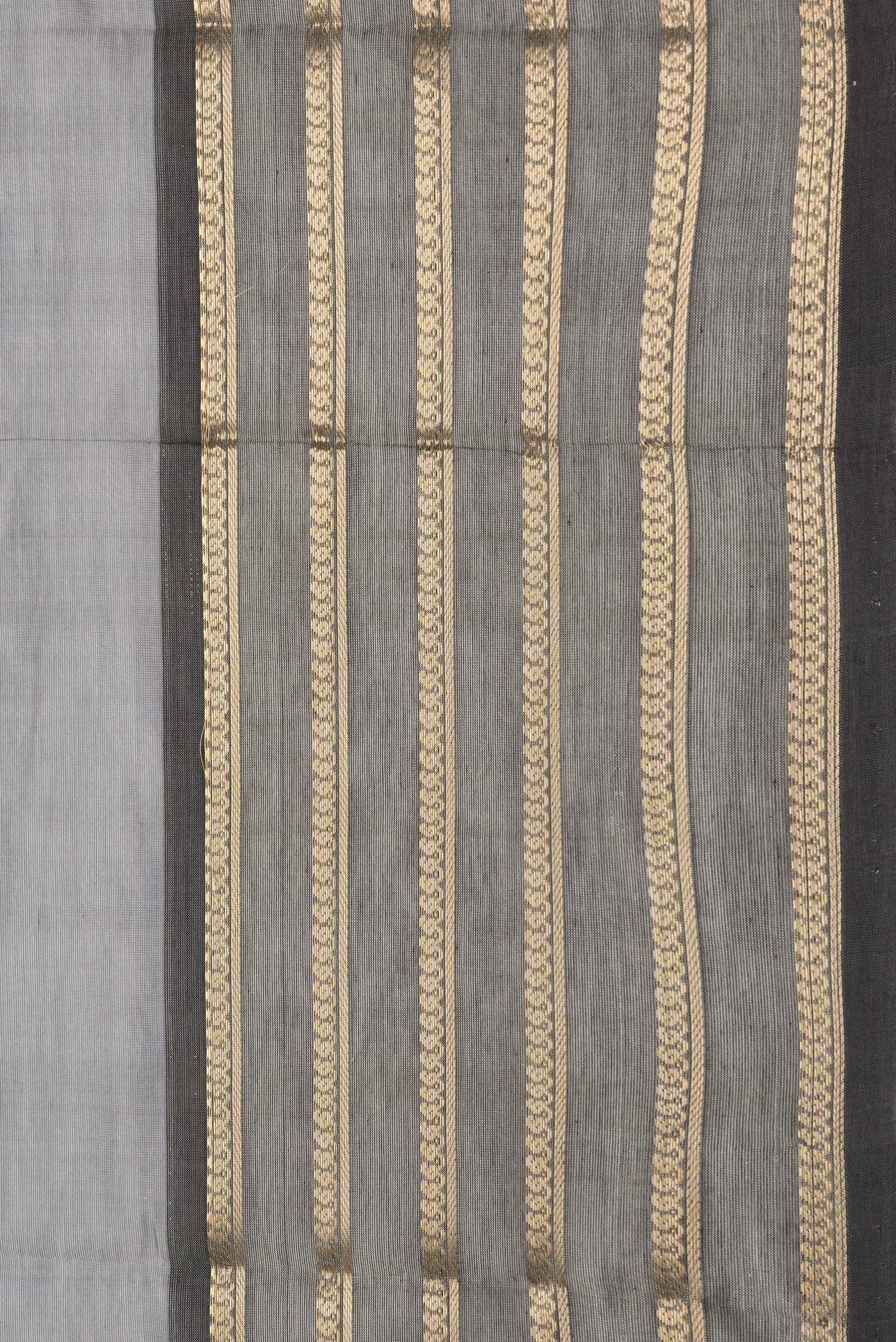 Border image of Grey Dual Tone Silk Cotton Saree with Zari Butta on the body and Zari Border. 