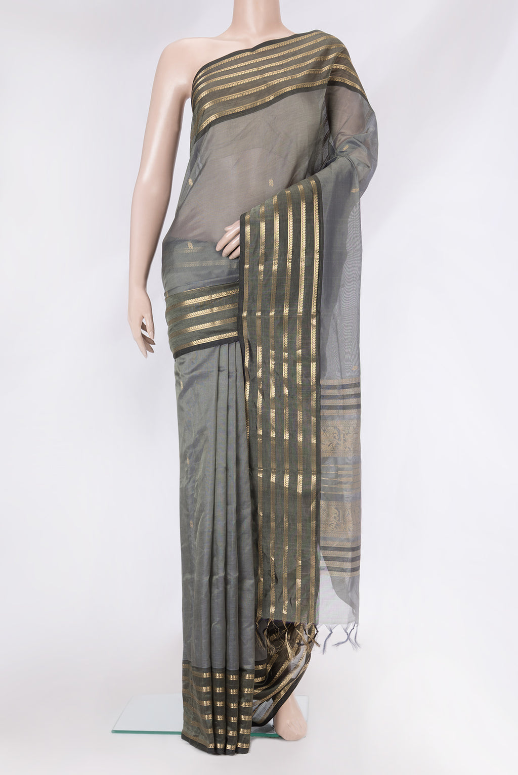 Grey Dual Tone Silk Cotton Saree with Zari Butta on the body and Zari Border.  displayed on a mannequin