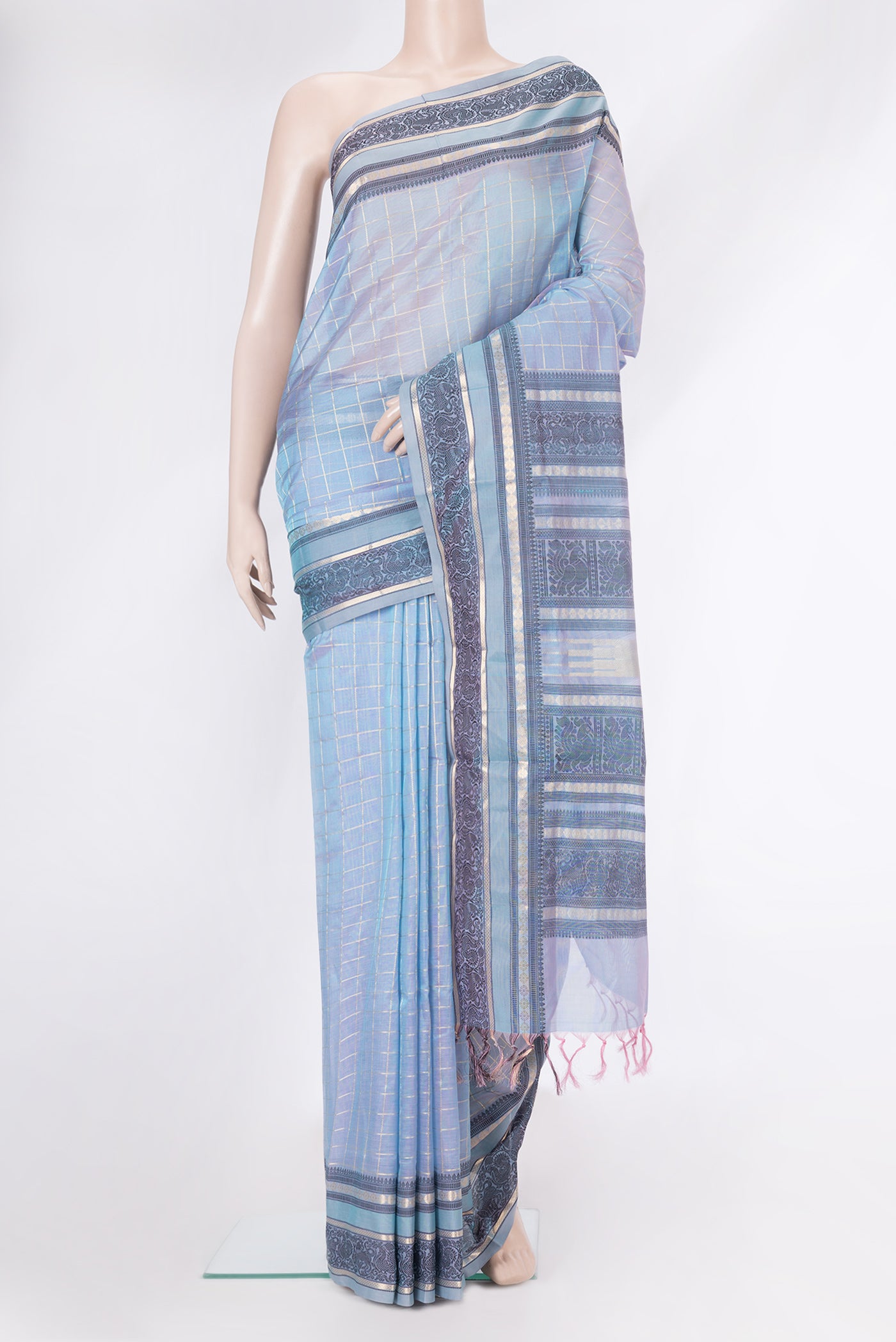 Peacock Blue Dual Tone Silk Cotton Saree with Checked design on the body and Zari And Thread Border.  displayed on a mannequin