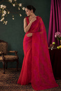 Model wearing a Bella Red floral design saree from Embroidered Romance Collection by Nalli
