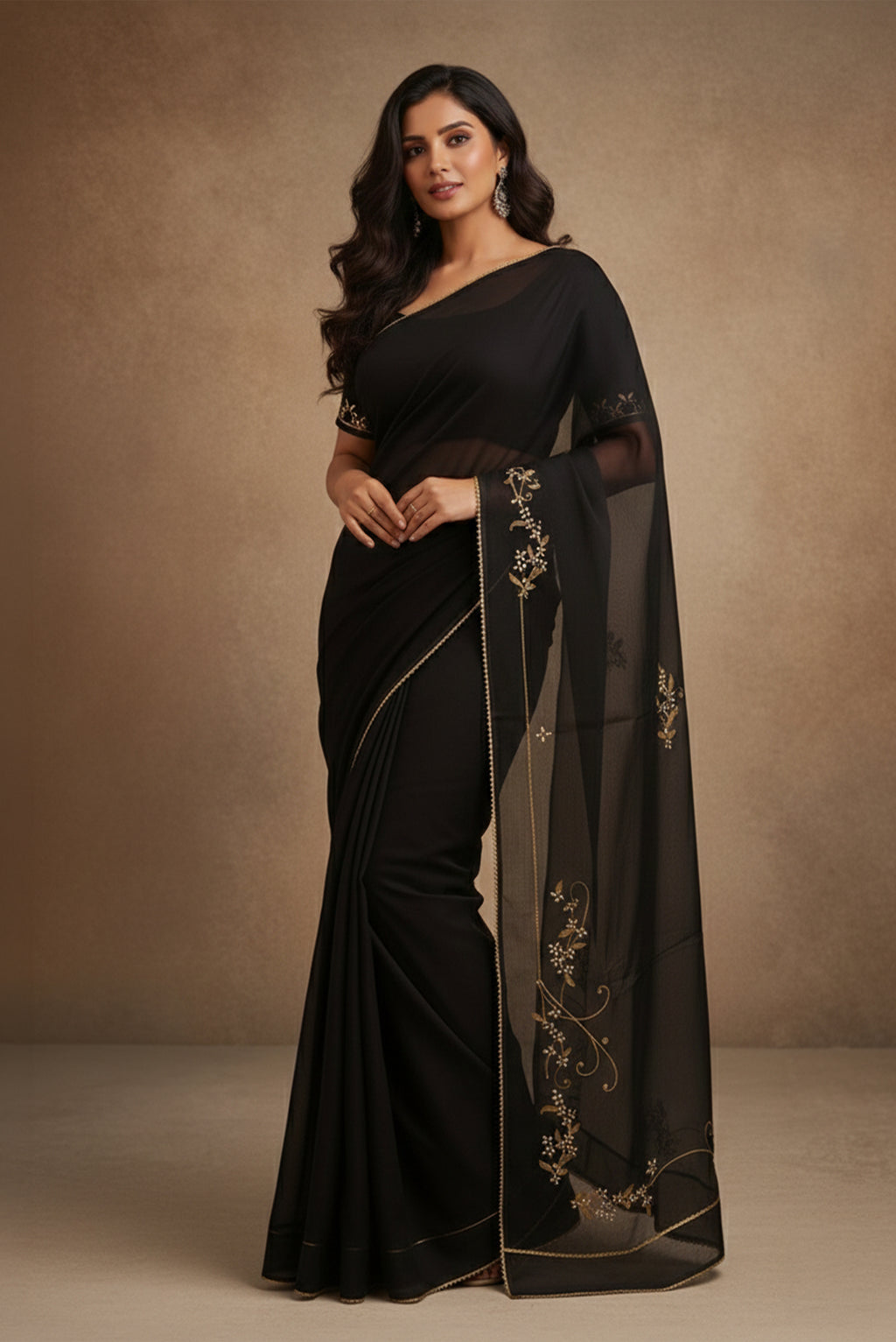 Model wearing a Mahira organza saree is inspired by the hydrangea blooms of the Art Nouveau movement Along the border and edges, bold, simplified hydrangea blooms pair with fluid, curving stems The flowers gain soft dimension through pani-zari zardozi, while antique-gold aari embroidery adds depth and balance The pallu features three large asymmetrical butas, formed as flowing clusters of hydrangea blooms and stems, creating a graceful focal point