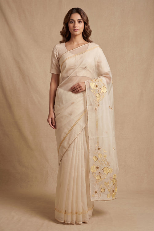 Model wearing a Aboli-Cream Organza Silk Saree