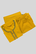 Flat lay of Mustard Pure Cotton Womens Kurta set featuring Thread Butta Kurta paired with Mustard Stripes bottom and a Thread Butta dupatta in Mustard