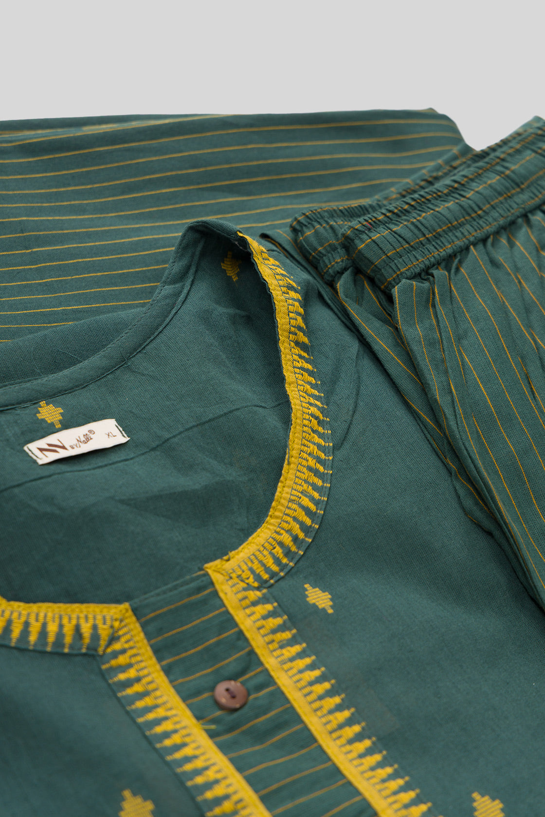 Detailed shot of Green Pure Cotton Womens Kurta set featuring Thread Butta Kurta paired with Green Thread Butta bottom and a Thread Butta dupatta in Green