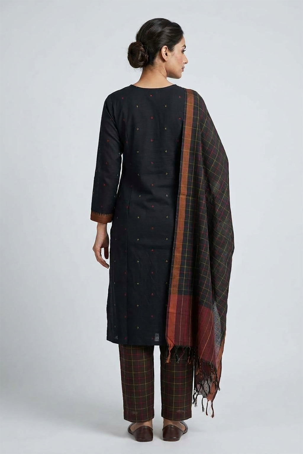 Black Pure Cotton Womens Kurta set featuring Thread Butta Kurta paired with Black Checks bottom and a Checks dupatta in Black back image displayed on an AI model