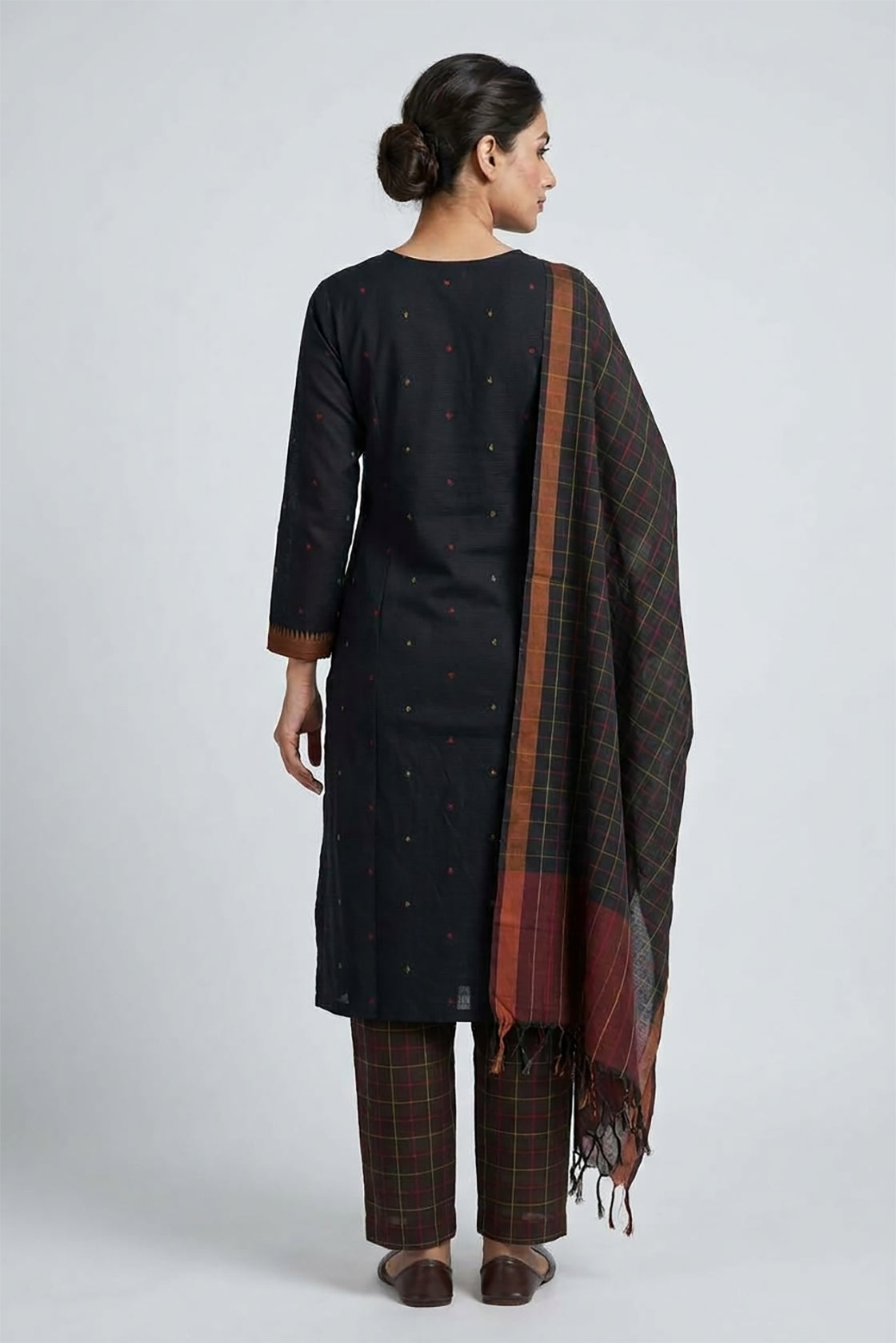 Black Pure Cotton Womens Kurta set featuring Thread Butta Kurta paired with Black Checks bottom and a Checks dupatta in Black back image displayed on an AI model
