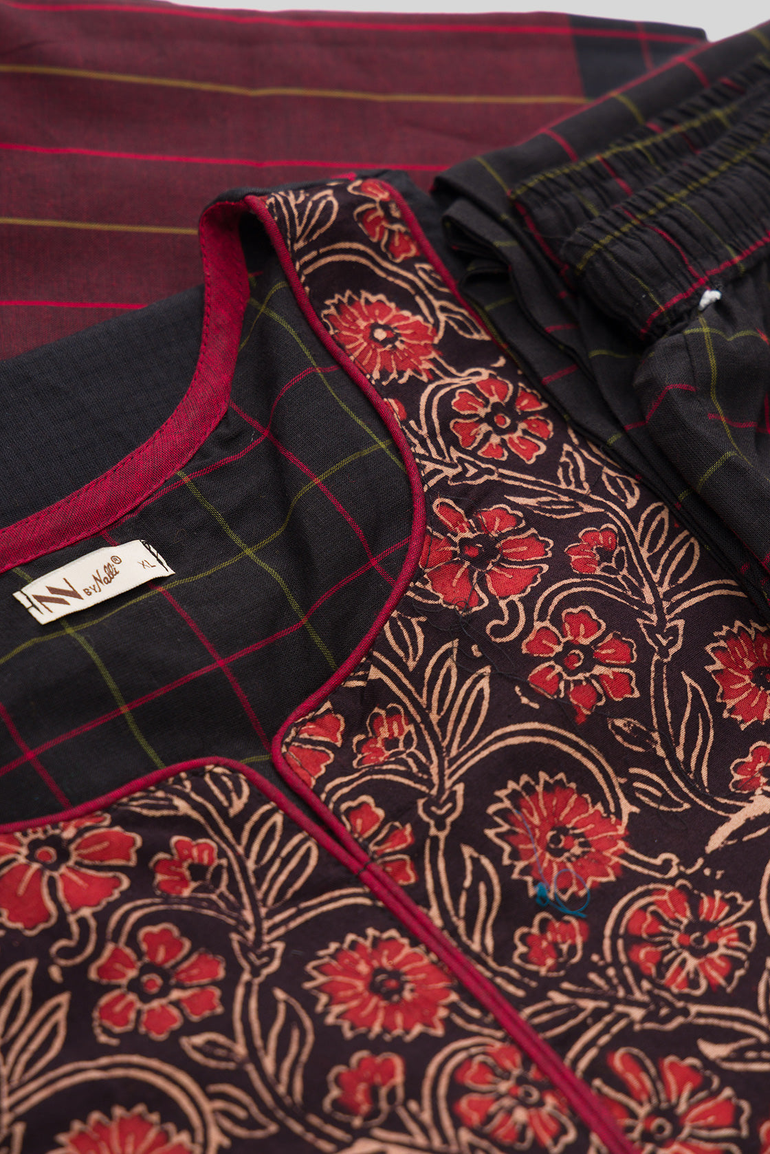 Detailed shot of Black Pure Cotton Womens Kurta set featuring Thread Butta Kurta paired with Black Checks bottom and a Checks dupatta in Black