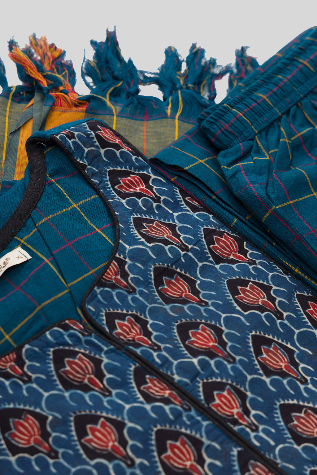 Detailed shot of Peacock Blue Pure Cotton Womens Kurta set featuring Thread Butta Kurta paired with Peacock Blue Checks bottom and a Checks dupatta in Peacock Blue
