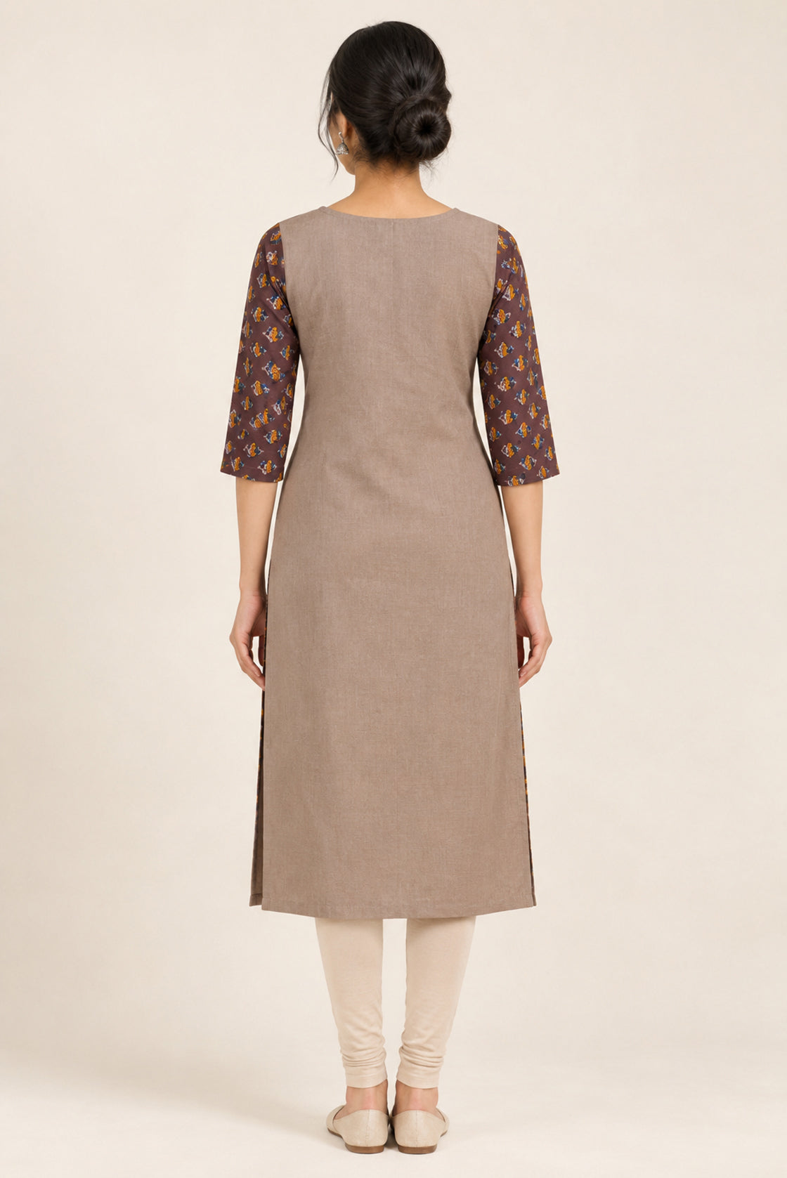 This Beige Cotton Kurta is crafted using Plain Woven detailing, featuring Plain Body design across the silhouette with Round neck back image displayed on an AI model