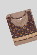 Top view of This Beige Cotton Kurta is crafted using Plain Woven detailing, featuring Plain Body design across the silhouette with Round neck
