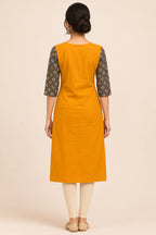This Mustard Cotton Kurta is crafted using Plain Woven detailing, featuring Plain Body design across the silhouette with Round neck back image displayed on an AI model