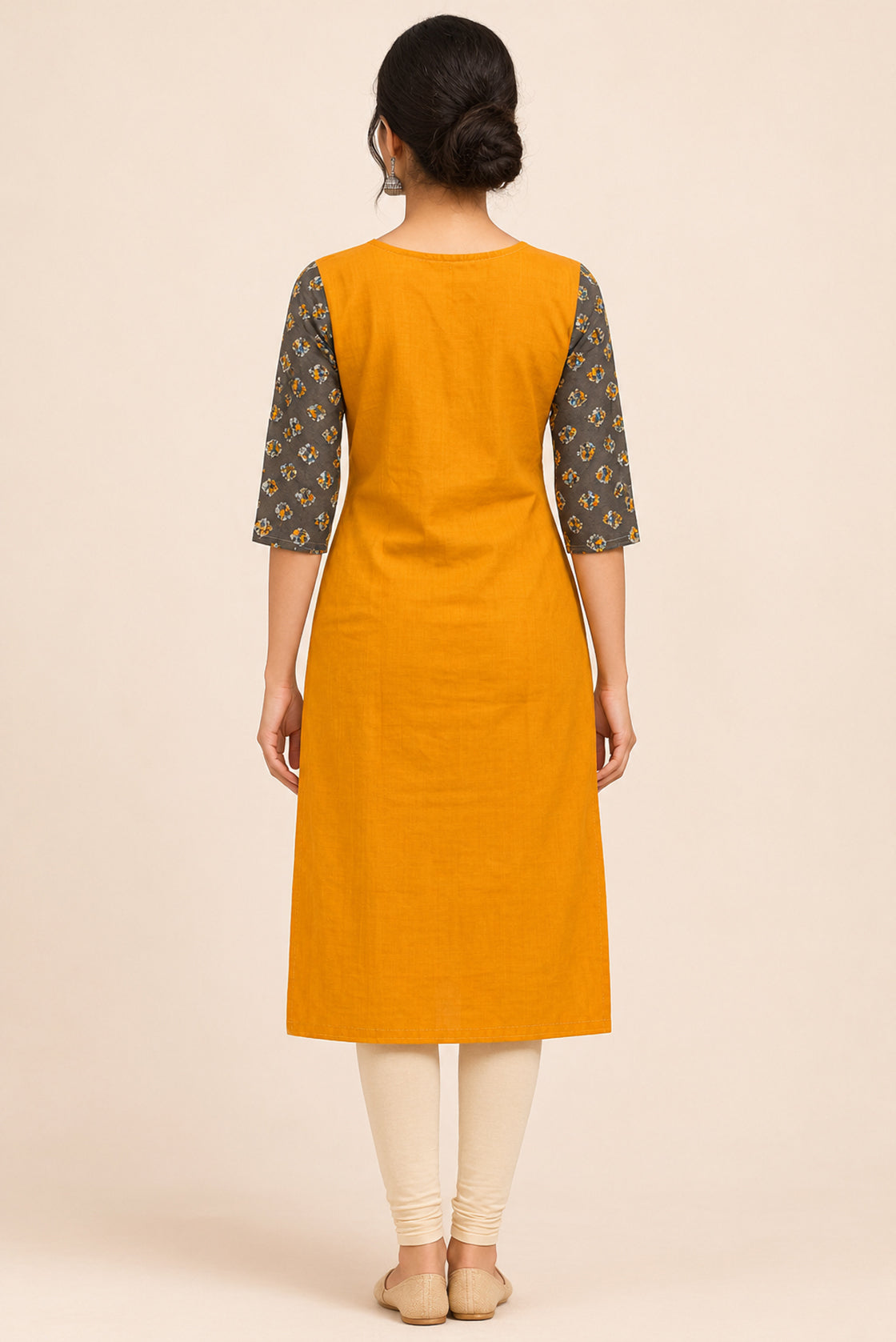 This Mustard Cotton Kurta is crafted using Plain Woven detailing, featuring Plain Body design across the silhouette with Round neck back image displayed on an AI model