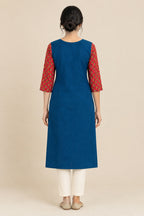 This Blue Cotton Kurta is crafted using Plain Woven detailing, featuring Plain Body design across the silhouette with Round neck back image displayed on an AI model