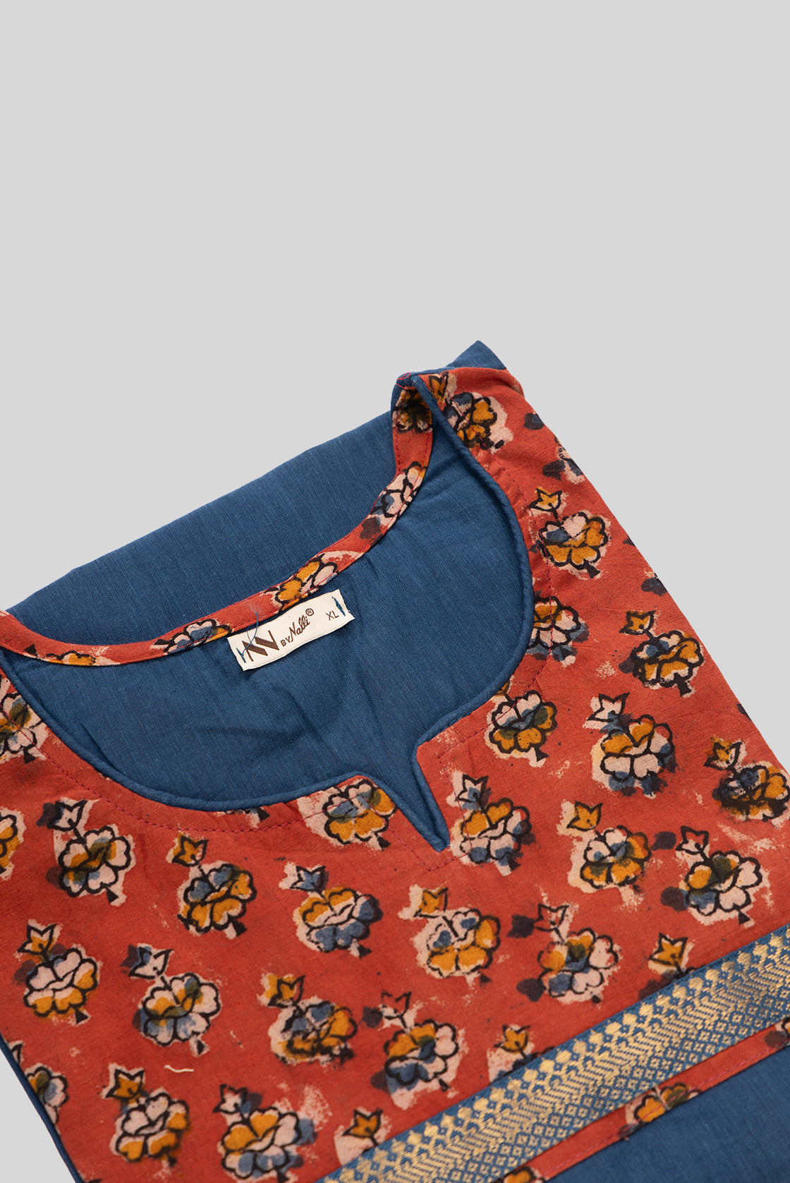 Detailed shot of This Blue Cotton Kurta is crafted using Plain Woven detailing, featuring Plain Body design across the silhouette with Round neck