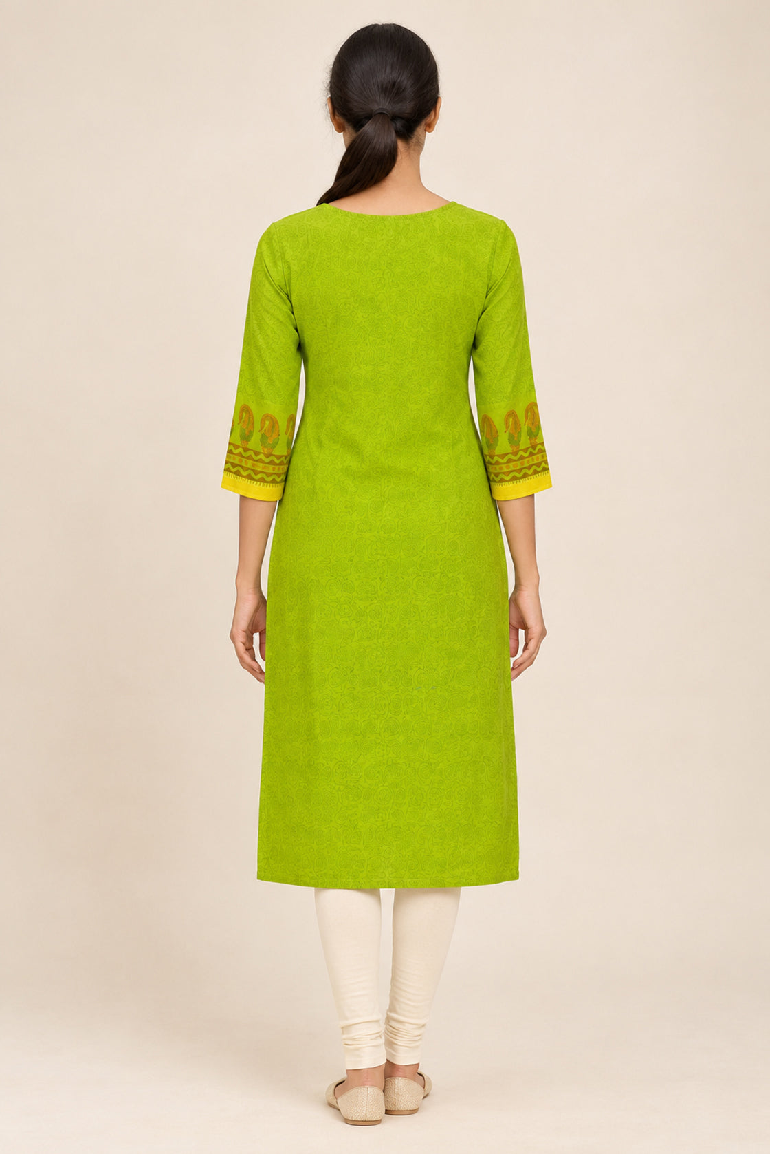 This Parrot Green Cotton Kurta is crafted using Plain Woven detailing, featuring Plain Body design across the silhouette with Round neck back image displayed on an AI model