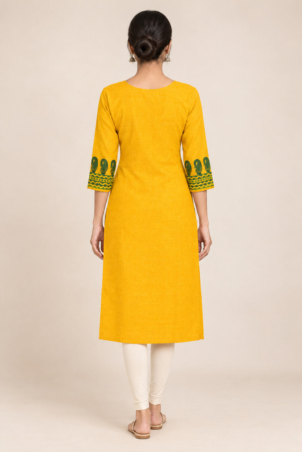 This Yellow Cotton Kurta is crafted using Plain Woven detailing, featuring Plain Body design across the silhouette with Round neck back image displayed on an AI model